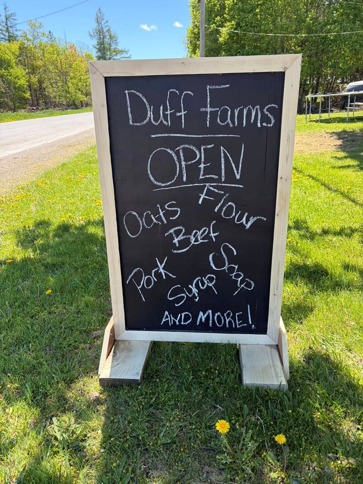 Duff Farms open farm shop chalkboard sign in Hodgdon, Maine