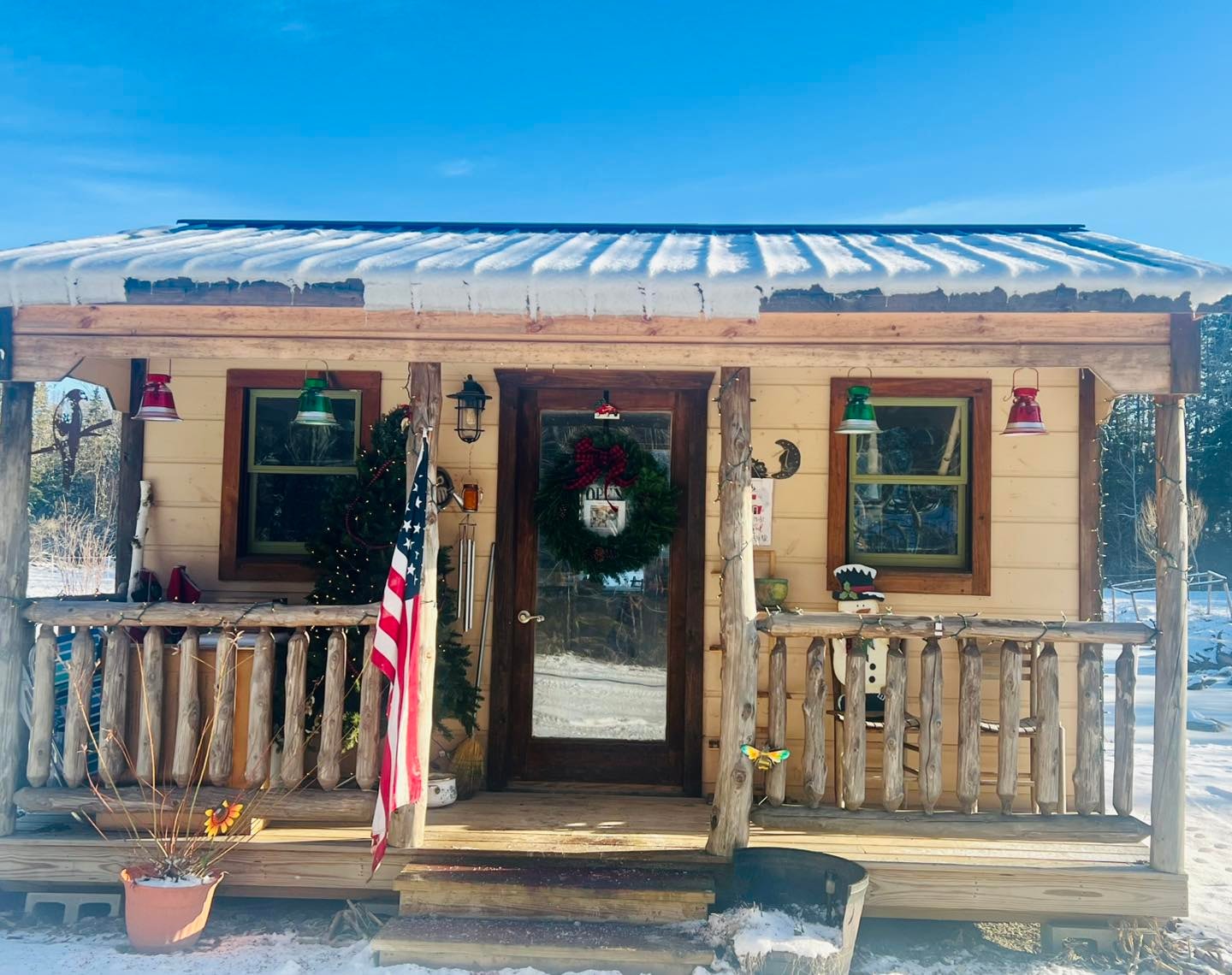 Willow Wood Farm & Apothecary's decorated porch and shop in winter